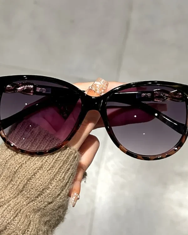 Lunettes de soleil œil de chat Élégance, coloris noir léopard